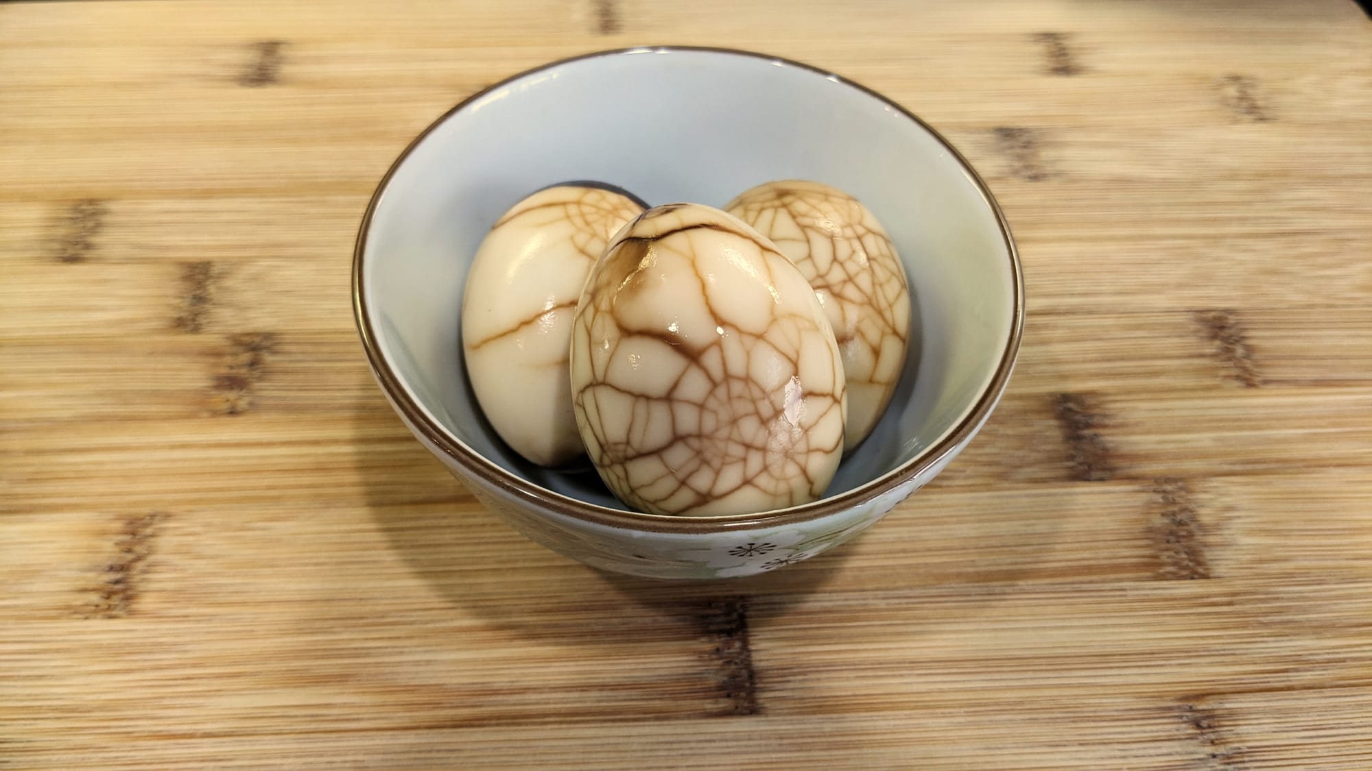 Close-up of Taiwanese tea eggs showing their signature brown marbled pattern from soy sauce and black tea braising.